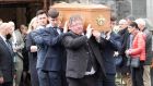 The coffin bearing the remains of Michael O’Kennedy leaves St Mary of the Rosary Church, Nenagh, for burial. Photograph Liam Burke/Press 22