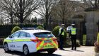 Gardaí outside the gates of Seán Quinn’s home outside Ballyconnell, Co Cavan, as the businessman’s home is searched on Wednesday morning. Photograph: Lorraine Teevan