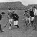 1921: Michael Collins throws in the ball to start a hurling match at Croke Park, Dublin. Photograph: Hogan/Hulton Archive/Getty 1921: Michael Collins throws in the ball to start a hurling match at Croke Park, Dublin. Photograph: Hogan/Hulton Archive/Getty