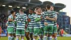 Daniel Mandroiu of Shamrock Rovers is congratulated by teammates after scoring the winner against Dundalk at Tallaght Stadium. Photograph: Ken Sutton/Inpho 