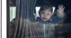  Ukrainian refugee baby waves from a minibus taking him and his mother further into Moldova: People fleeing war rarely see themselves as victims – this is a term they reserve for casualties and fatalities.  Photograph: Christophe Archambault/AFP 