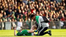 Limerick’s Cian Lynch down injured. Photograph: Ryan Byrne/Inpho