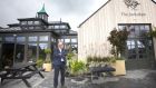 Pat Rigney, founder of the Shed Distillery in Co Leitrim, outside its €3.5 million visitor centre in Drumshanbo. Photograph: Brian Farrell 