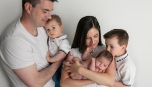 Laura Guckian, her husband, Brendan, and their three children: They both  organise their work around childcare, with her working evenings and weekends while he is on a more traditional schedule 