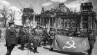 A Red army victory ceremony in front of the ruined Reichstag (chancery) building, Berlin, Germany, May 1945. File photograph: Sovfoto/Universal Images Group via Getty 