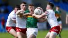 Kerry’s Jordan Kissane comes under pressure from Tyrone tacklers during the  All-Ireland U20 championship semi-final at   MW Hire O’Moore Park, Portlaoise. Photograph: Ashley Cahill/Inpho 