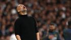 Pep Guardiola reacts during the frustrating defeat to Real Madrid in the Champions League semi-final at the Bernabeu. Photograph:  Paul Ellis/AFP/Getty 
