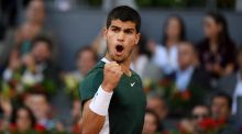  Carlos Alcaraz celebrates during his Madrid Open final victory over  Alexander Zverev  at the Caja Magica in Madrid. Photograph: Oscar Del Pozp/AFP/Getty