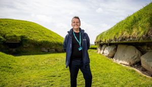 Tour guide Aengus Mac Grianna at Knowth archaeological site. Photograph: Tom Honan