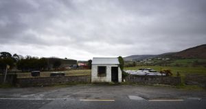 A former customs guard hut at the Border near Newry. In polls, almost 80 per cent of respondents in the Republic say they would not accept higher taxes to pay for a united Ireland. In the North, just 25 per cent say they would pay higher taxes as a price for Irish unity. Photograph: Charles McQuillan/Getty Images