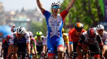 Team Groupama-FDJ’s French rider Arnaud Demare celebrates as he crosses the finish line to win the fifth stage of the Giro d’Italia between Catania and Messina in  Sicily. Photograph:  Luca Bettini/AFP via Getty Images