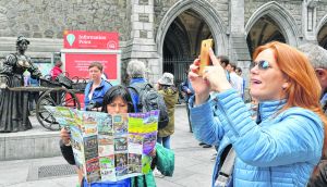 Tourists in Dublin: Fraught discussions around the VAT rate have been central to the Irish tourism industry for more than a decade.   Photograph: Alan Betson / The Irish Times