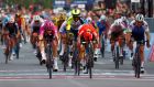 Arnaud Demare (left) crosses the finish line to win stage six of Giro d’Italia  ahead of  Caleb Ewan (centre). Photograph: Luca bettini/AFP via Getty Images