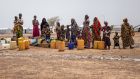 Women queue at a water pump: ‘In some places in Burkina Faso people wait in line for 72 hours to access boreholes,’ says Patrick Youssef, Africa director for the International Committee of the Red Cross. Photograph: Olympia de Maismont/AFP 