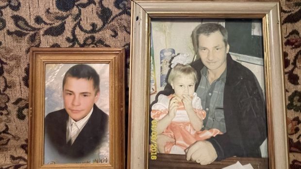 Sasha Leus (left) and his father Serhiy holding Sasha’s daughter Alisa. Russian troops shot dead Serhiy (58) and Sasha (32) during their occupation of villages near Kyiv in February and March. Photograph: Daniel McLaughlin