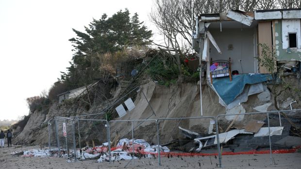 Gráinne Hennigan’s house on Portrane beach in north Co Dublin. The house has collapsed due to coastal erosion damage. Photograph: Laura Hutton