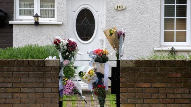 Flowers outside the home of Lisa Thompson who was found in Ballymun on Tuusday. Photograph: Colin Keegan, Collins Dublin