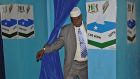 A  Somali MP exits a voting booth in Garowe in Somalia’s semi-autonomous Puntland region back in 2014.  The presidential election takes place  this  Sunday. Photograph: AFP via Getty 