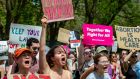 Activists demonstrate during a Planned Parenthood Pro-Choice Rally in Boston, Massachusetts, on Saturday.  Thousands of activists are participating in a national US day of action calling for safe and legal access to abortion. Photograph: Joseph Prezioso/AFP/Getty 