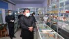 A photo released by the official North Korean Central News Agency shows North Korean leader Kim Jong-un (centre) inspecting a pharmacy in Pyongyang, North Korea, on May 15th. Photograph: KCNA/EPA