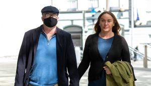 Former solicitor Michael Lynn  and his wife Brid leaving Dublin Circuit Criminal Court on Monday.  Photograph: Collins Courts