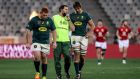  South Africa director of rugby Rassie Erasmus speaks to Eben Etzebeth and Steven Kitshoff on the field acting as a waterboy during last year’s Lions series. Photograph: Dan Sheridan/Inpho