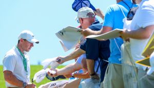 Rory McIlroy   signs autographs for fans during a practice round prior to the start of the US PGA Championship at Southern Hills in Tulsa, Oklahoma. Photograph: Andrew Redington/Getty Images