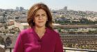 Al Jazeera journalist Shireen Abu Akleh standing with the Old City of Jerusalem in the background. Photograph: EPA/Al Jazeera