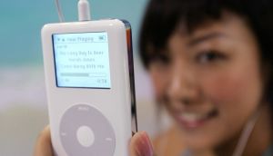 The first and second generation white iPods with the scroll wheel, released in 2001 and 2002, were things of digital beauty. Photograph: Samantha Sin/AFP via Getty 