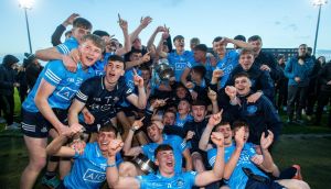 Dublin celebrate with the trophy after winning the Leinster minor title. Photograph: Ryan Byrne/Inpho