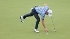 Justin Thomas finishes his second round on the ninth green at Southern Hills. Photograph: Christian Petersen/Getty Images