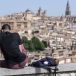  A man rests under the sun with the old quarter of the city of Toledo in the background, as temperatures soar in central Spain. Photograph: Ismael Herrero/EPA