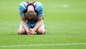 Nathan Collins of Burnley looks dejected following defeat and relegation to the Sky Bet Championship. Photograph: Jan Kruger/Getty