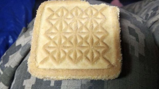 Olena, a Ukrainian military nurse, sent her daughter this photograph of a simple biscuit on Easter Sunday, and said it was all that people in the besieged Azovstal factory in Mariupol had to celebrate the feast day. Photograph courtesy of Lesia