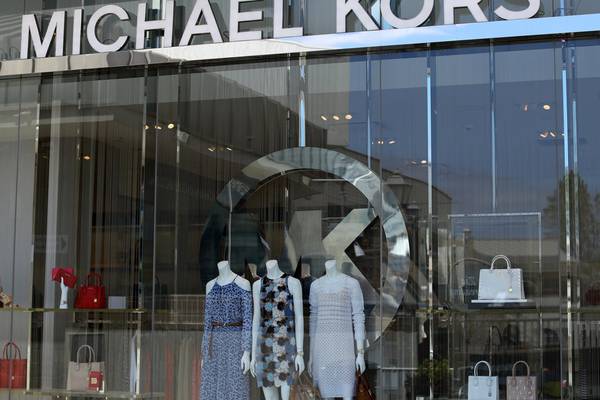 Michael Kors slumps on weak forecast with plans to shut over 100 stores