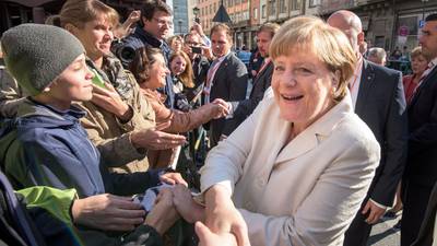 Refugee crisis overshadows German celebration of unity