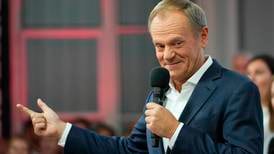 Poland election: Opposition leader Donald Tusk declares victory after ruling party appears to have fallen short