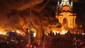 Ukraine's riot police storm protest camp after deadly clashes