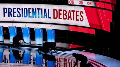 Democratic candidates jostle and gripe as debates narrow field