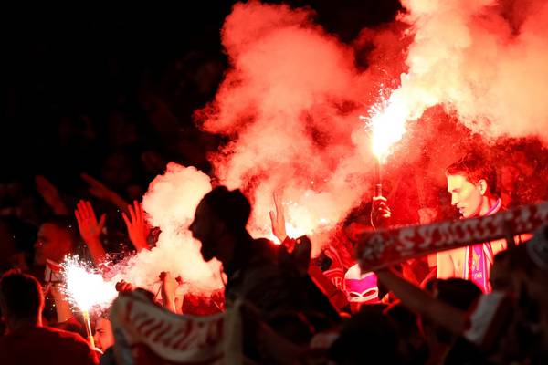 Cologne and their fans come but Arsenal conquer on bizarre night