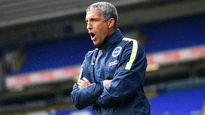 Chris Hughton would take a 17th-placed finish right now