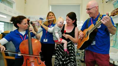Music team strikes  a chord with sick children in hospital