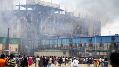 Bangladesh factory fire kills at least 52 and injures 20