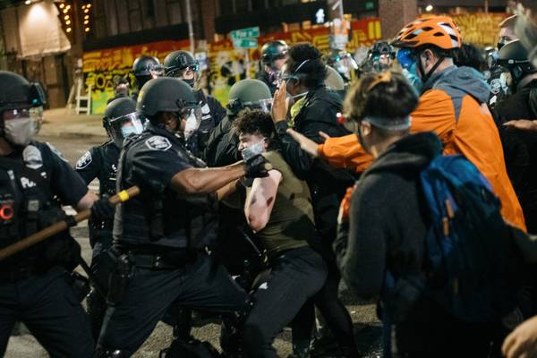 Seattle and Portland declare riots as presence of troops ignites protests