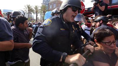 Dozens arrested during clashes at Donald Trump rally