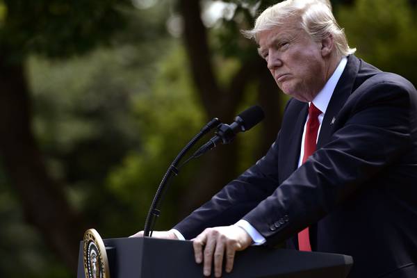Trump advisers seek to play down growing pardon row
