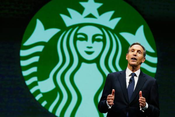 Howard Schultz suspends buybacks as he returns to Starbucks