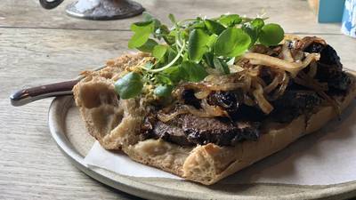 Venison steak sandwich with sticky onions and Cashel Blue butter