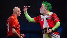 Darts’ Ally Pally is place of uninhibited escapism where Peter Wright is dressed as The Grinch