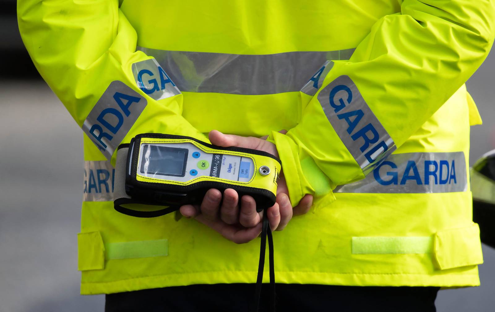 14/03/2022  A Garda with an intoxilyzer alcohol meter  pictured this morning at a Garda checkpoint on Chapelizod Road, Dublin  at the launch of an appeal by the Road Safety Authority (RSA) and An Garda Síochána for their St. Patrick’s Weekend Bank Holiday road safety appeal. The RSA and An Garda Síochána will focus their appeal on drink driving but particularly drink driving the morning after.....Picture Colin Keegan, Collins Dublin